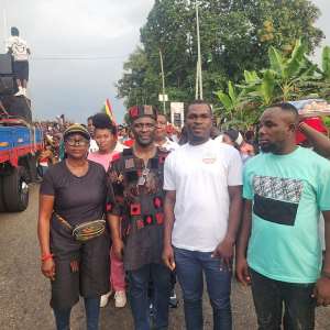 Togbe Koku Dzaga standing in a picture with Evans Buami during the yam hailing ceremony of the 2025 Klefe Yam Festival