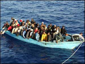 20 die as smugglers force migrants overboard