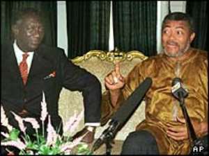 Rawlings r accepted electoral defeat by Kufuor l