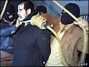 In a last act of defiance Saddam Hussein refused to wear a hood