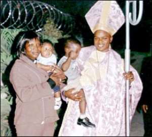 Bishop Obinim and wife, Florence with children