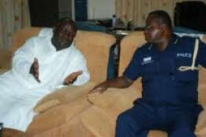 Mr Kenneth Ashigbey - MD of GCGL Left, in a discussion with Western Regional Police Commander, Ransford Moses Ninson