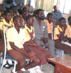 The Mayor middle some pupils of the Osu Home JHS interacting with the Bounzel School in New York through the internet