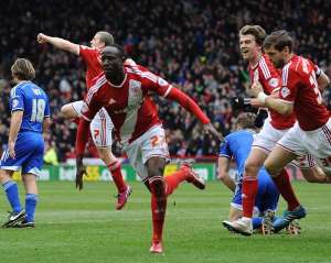 Adomah celebrates his goal