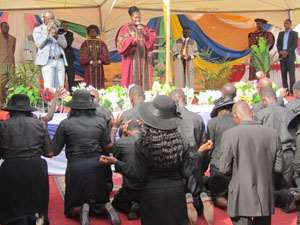 Rev. Dr. Opoku-Amuaben praying for the ordained ministers