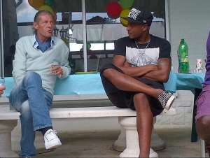 Andre Ayew right and convalescing Bruno Metsu last month.