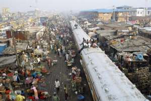 Commuters sit on coaches of a train in Lagos, Nigeria, in 2007.  By Pius Utomi Ekpei AFPFile