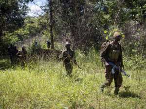 Soldiers of the Uganda People's Defence Force UPDF patrol in the jungle in the Central African Republic as they look for Lord's Resistance Army LRA fighters on June 24, 2014.  By Michele Sibiloni AFPFile