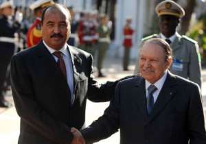 Algerian President Abdelaziz Bouteflika R shakes hands with his Mauritanian counterpart Mohamed Ould Abdel Aziz.  By Farouk Batiche AFPFile