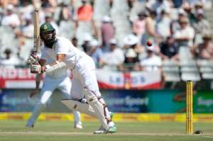 South Africa batsman and captain Hashim Amla plays a shot during the third day of the second Test against England at Newlands Stadium in Cape Town on January 4, 2016.  By Gianluigi Guercia AFP