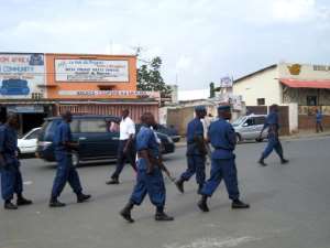 Police patrol a street of Bujumbura on September 26, 2013.  By Esdras Ndikumana AFPFile