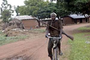 A member of a vigilante group patrols following attacks by Hausa Fulani herdsman in Plateau State in 2004.  By Pius Utomi Ekpei AFPFile