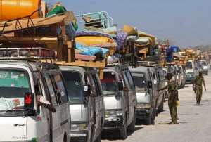 Somalis flee an earlier AU attack against Shebab in Afgoye, where a new assault Tuesday launched a fresh exodus.  By Mohamed Abdiwahab (AFP/File)