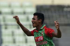 Bangladesh cricketer Mustafizur Rahman reacts after the dismissal of the South Africa's Quinton de Kock during the second ODI in Dhaka on July 12, 2015.  By Munir Uz Zaman AFP