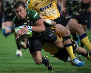 Handre Pollard of the Bulls scores a try during a Super 15 Rugby Union match against the Hurricanes at McLean Park in Napier, New Zealand on April 5, 2014.  By Marty Melville (AFP/File)