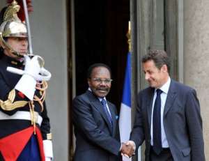 Nicolas Sarkozy welcomes Omar Bongo left prior to a bilateral meeting at the Elysee Palace in Paris.  By Gerard Cerles AFPFile