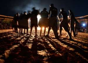San people perform the Healing and Ritual dance on August 3, 2012 in Ghanzi, Botswana.  By Monirul Bhuiyan (AFP)