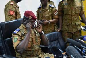 Isaac Zida L, named by Burkina Faso's army as interim leader, sits before a press conference on November 6, 2014 in Ouagadougou.  By Issouf Sanogo AFPFile