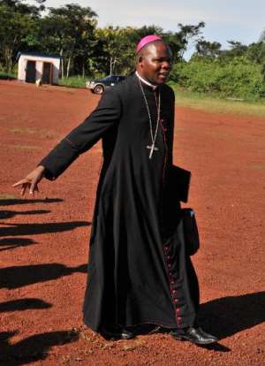 Banguis archibishop Dieudonne Nzapalainga after a conciliation meeting with members of the Christian and Muslim communities on October 8, 2013 in Bangassou.  By Issouf Sanogo (AFP/File)