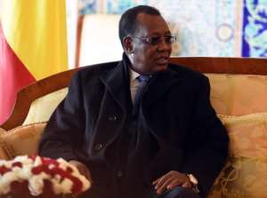 The President of Chad Idriss Deby sits upon his arrival at Houari Boumediene Airport outside Algiers on December 27, 2014.  By Farouk Batiche AFPFile