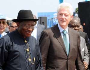 Nigerian President Goodluck Jonathan (L) and former US president Bill Clinton on February 21, 2013, at Eko Atlantic. By Pius Utomi Ekpei (AFP)