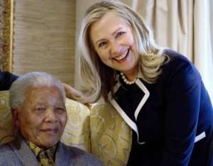 US Secretary of State Hillary Clinton meets with Nelson Mandela, 94, former president of South Africa on August 6. By Jacquelyn Martin (AFP)