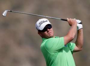 Among nine golfers on 204 at the Joburg Open is defending champion George Coetzee pictured on February 21, 2014 in Marana, Arizona who fired a second consecutive 69 to finish three strokes adrift of the leader.  By Matt Sullivan Getty ImagesAFPFile