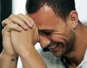 In this file photo, Quade Cooper is seen during a press conference in Auckland, on October 12, 2011.  By Greg Wood (AFP/File)