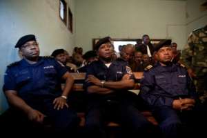 Daniel Mukalay L, former head of Police Special Services, and four other policemen attend their trial for the murder of human rights activist Floribert Chebeya in Kinshasa on November 12, 2010.  By Gwenn Dubourthoumieu AFPFile