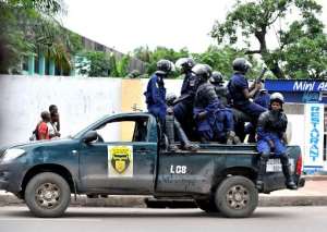 Police on patrol in Kinhasa on November 20, 2012 as they monitor a student protest.  By Junior D. Kannah (AFP)