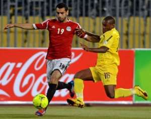 Egypts striker Mohammed Salah (L) challenges Mozambiques defender Miro.  By  (AFP)