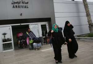 Palestinians returning to Gaza arrive through the Rafah border crossing on November 26, 2014.  By Said Khatib AFPFile