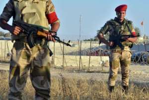 Egyptian soldiers are deployed in the area of the Rafah Crossing between Egypt and the Gaza Strip on May 21, 2013.  By Mohamed el-Shahed (AFP/File)