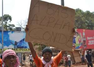 Supporters of Guinea opposition political party protest against the country's president Alpha Conde.  By Cellou Binali AFP