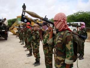 Militants belonging to Somalia’s Al-Qaeda-inspired Shebab Islamists stand in formation. By Stringer (AFP/File)