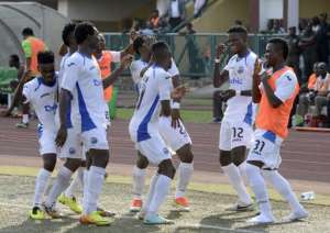 Enyimba players celebrate after scoring against the Dolphins during the Federation Cup final at Teslim Balogun Stadium in Lagos on November 23, 2014.  By Pius Utomi Ekpei AFPFile