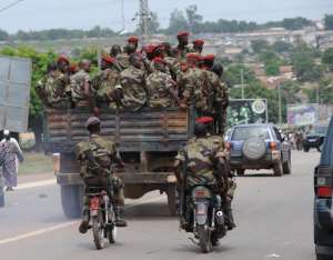 Soldiers of the New Forces FN rebel group are pictured in a truck prior to a change-of-command ceremony of their chief Ousmane Cherif on May 26, 2009, in Bouake, Ivory Coast.  By Sia Kambou AFPFile