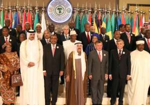 Kuwait's Emir Sheikh Sabah al-Ahmad Al-Sabah centre poses with Arab and African leaders at the start of a summit meeting in Kuwait City on November 17, 2013.  By Yasser al-Zayyat AFPFile