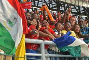 Equatorial Guinea supporters cheer during the 2015 Africa Cup of Nations group A match between Equatorial Guinea and Congo at Bata Stadium in Bata on January 17, 2015.  By Carl De Souza AFPFile