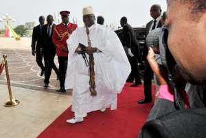 Gambia President Yahya Jammeh arrives at the Felix Houphouet-Boigny Foundation center in Yamoussoukro, Ivory Coast, on March 28, 2014.  By Issouf Sanogo AFPFile