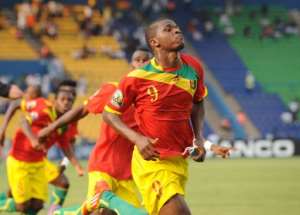 Guinea's Sadio Diallo celebrates after scoring.  By Pius Utomi Ekpei AFP