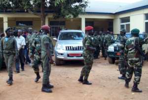 Soldiers of Guinea-Bissau leave after a meeting in Bissau.  By  (AFP)