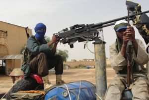 Islamist fighters stand guard near Gao airport. By Romaric Ollo Hien (AFP/File)