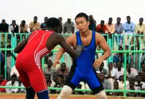Japan's wrestling diplomat in Sudan bout for final time