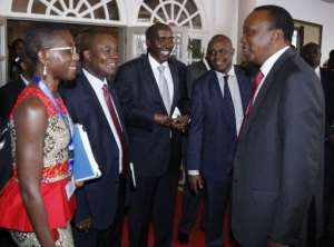 Kenya's President Uhuru Kenyatta R on September 17, 2013, in Nairobi.  By  KENYA PRESIDENTIAL PRESS SERVICEAFP