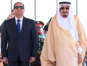 Handout picture by the Saudi Press Agency on March 1, 2015, shows Saudi Crown Prince Muqrin bin Abdulaziz al-Saud R with Egyptian President Abdel Fattah al-Sisi during a welcoming ceremony upon his arrival to the Saudi capital Riyadh.  By  SPAAFP