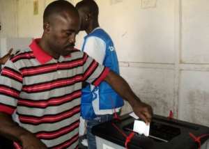 A man casts his vote on August 23 in Monrovia during Liberia's constitutional referendum.  By Zoom Dosso AFPFile