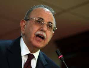 Libya's interim prime minister Abdel Rahman al-Kib speaks during a press conference in Tripoli.  By Mahmud Turkia AFP