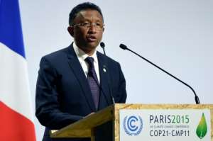 Madagascar's President  Hery  Rajaonarimampianina  delivers a speech during the opening day of the World Climate Change Conference 2015 COP21, on November 30, 2015 at Le Bourget, on the outskirts of the French capital Paris.  By Alain Jocard AFPFile
