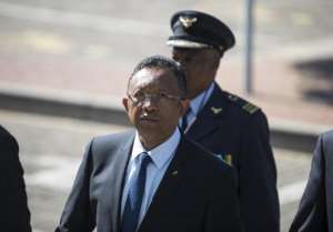 Malagasy President Hery Rajaonarimampianina C arrives on May 23, 2014, in Johannesburg.  By Mujahid Safodien AFPFile